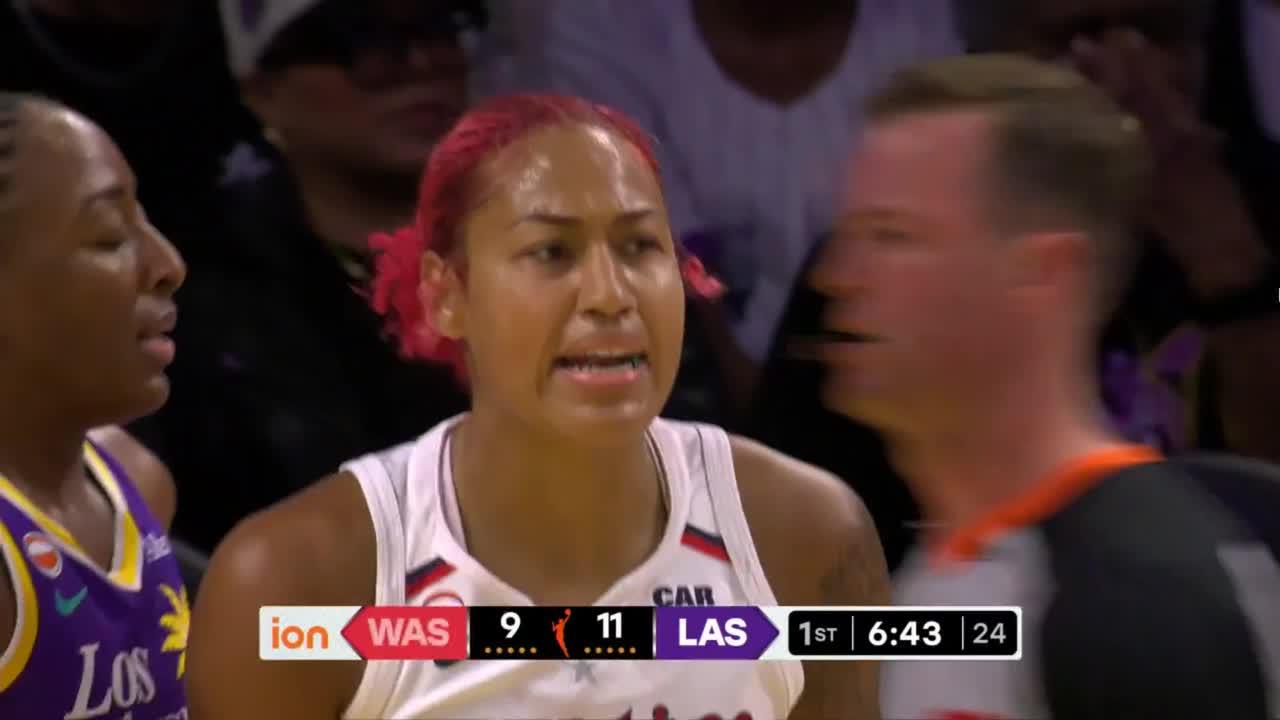 Shakira Austin gets the basket plus the foul