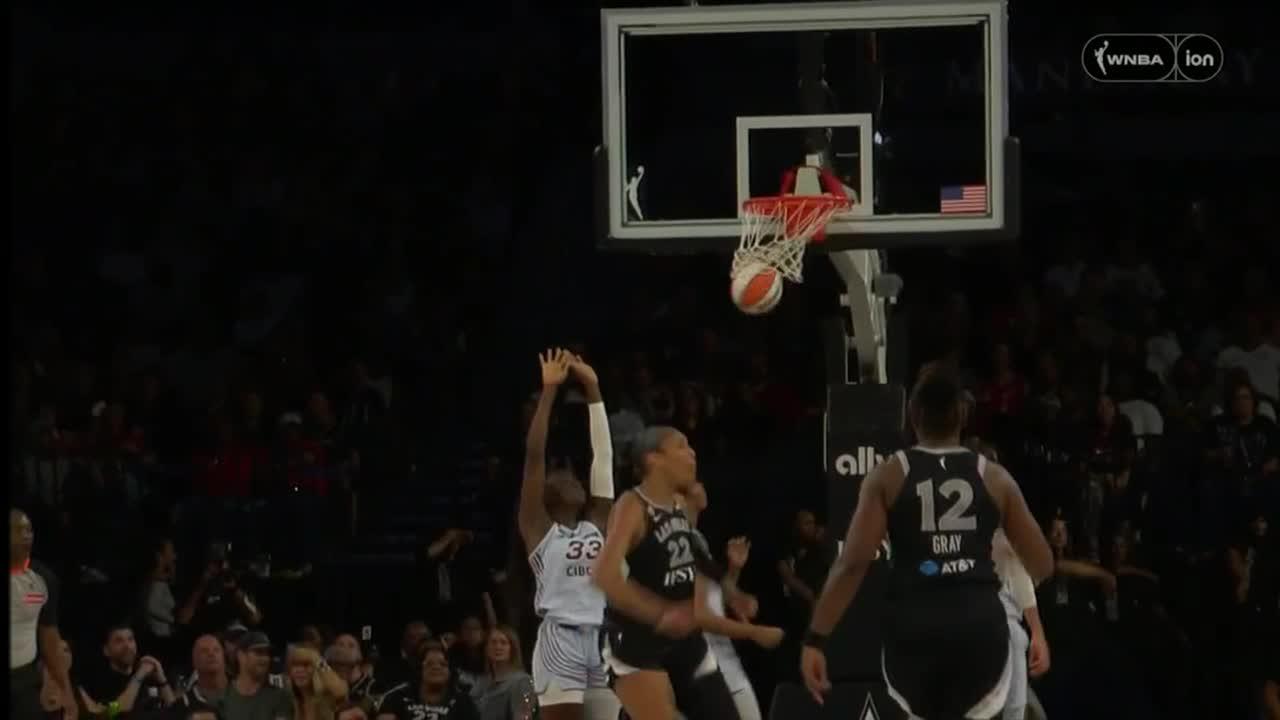 A'ja Wilson somehow gets the and-1 to fall