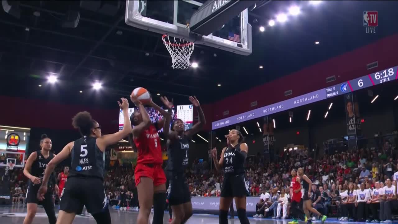 Angel Reese gets the hoop and the harm