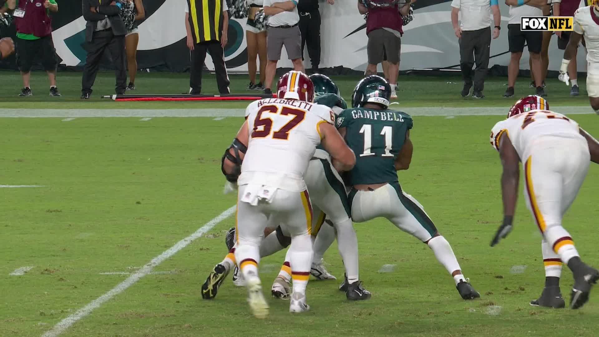 Jalen Hurts throws 3 TD passes and Eagles stuff Commanders' late 2-point try for 24-22 win