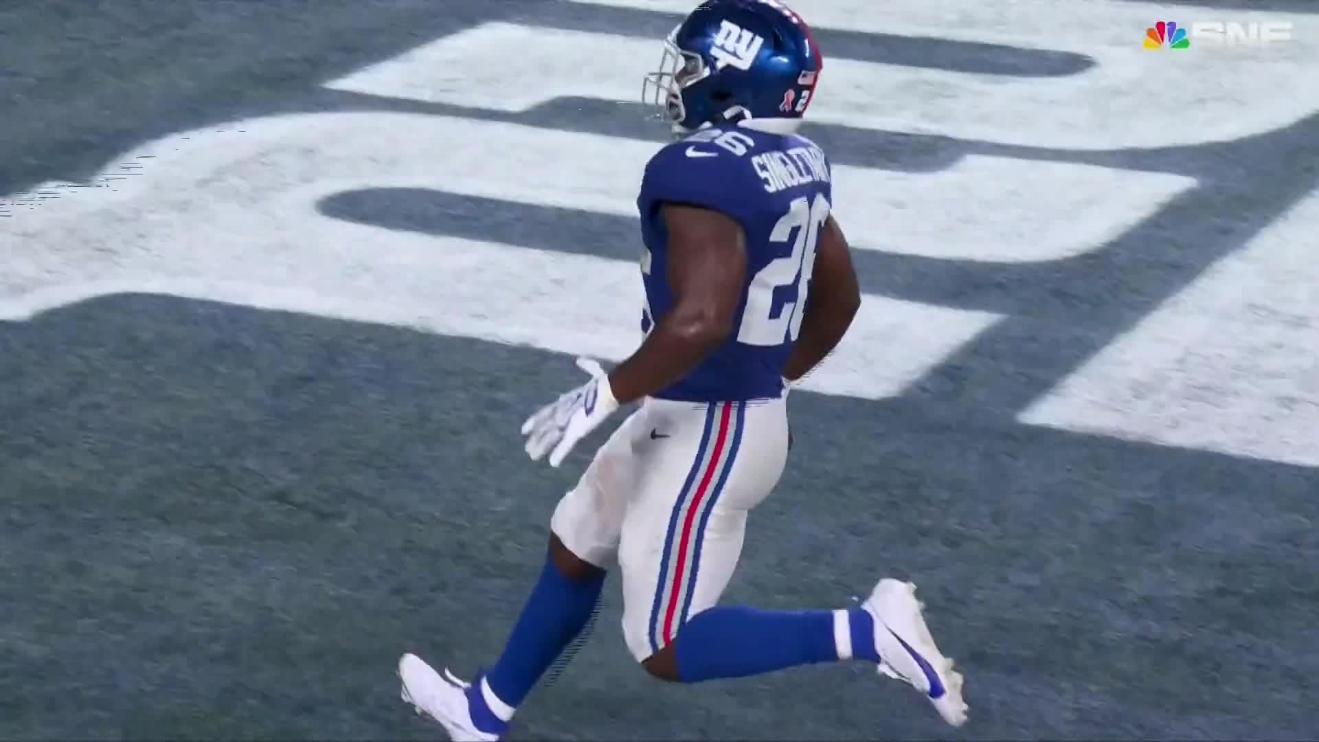 Giants' offense rolls over the Cowboys to give coach John Harbaugh a 28-20 win in his debut
