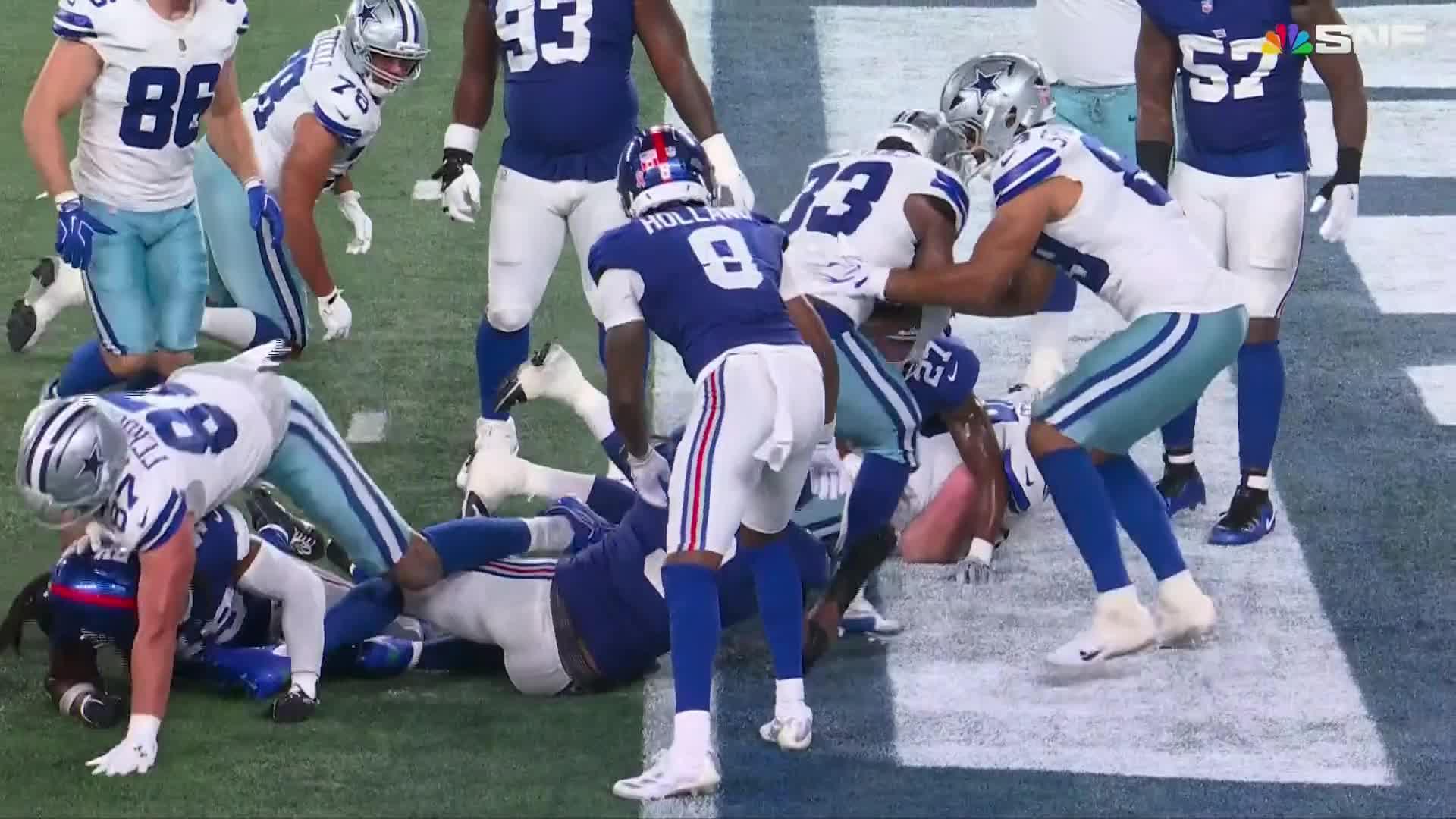 Giants' offense rolls over the Cowboys to give coach John Harbaugh a 28-20 win in his debut