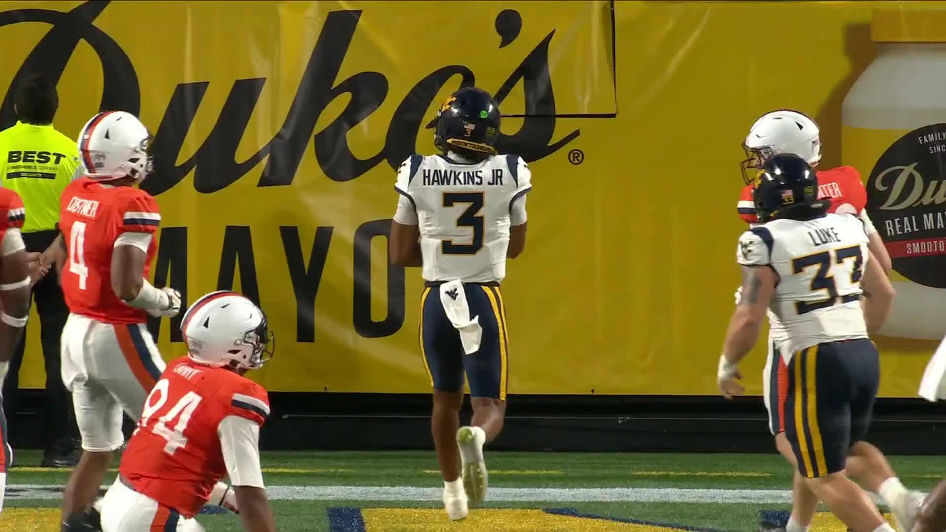 West Virginia beats No. 25 Virginia 38-27 in the Duke’s Mayo Classic