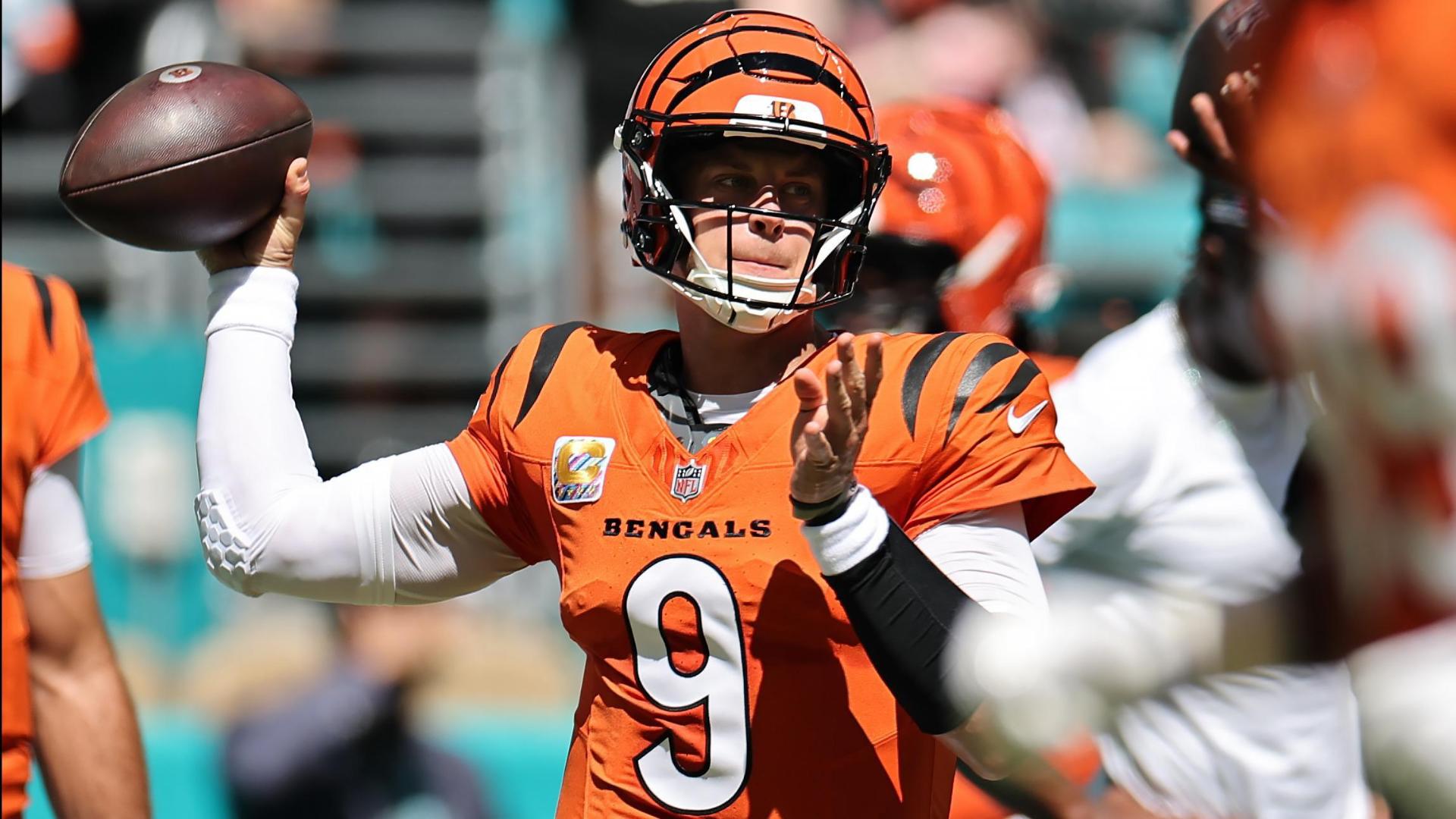 Burrow throws 4 TDs, Battle has pair of interceptions as Bengals beat Dolphins 31-24