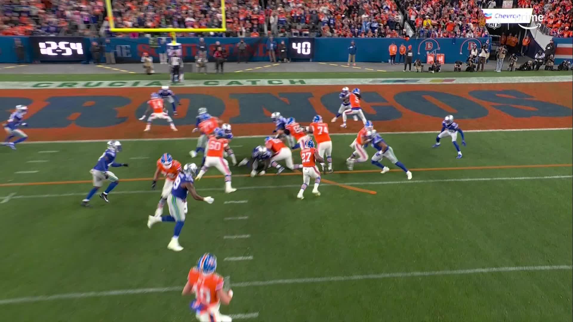 Broncos beat the Seahawks 17-14 in OT on Ja'Quan McMillian's pick, Wil Lutz's 53-yarder