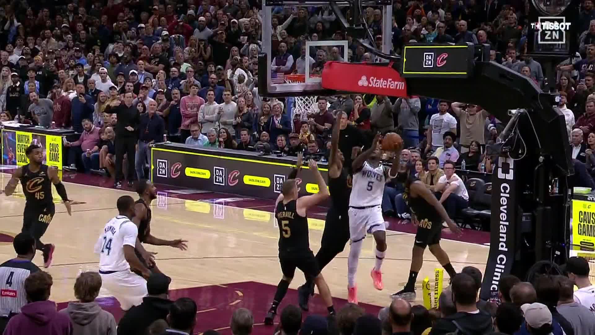 Mitchell scores 26 as Cavaliers rally and defeat Timberwolves 127-125 in overtime